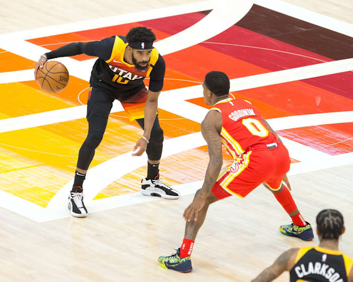 Mike Conley (10) takes on Brandon Goodwin (0) at half court